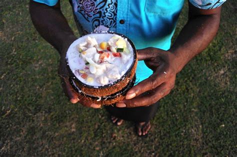 Indigenous Fijian Man Serves Fijian Food Kokoda Stock Photo - Download ...