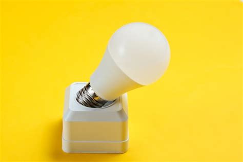 Premium Photo | Electrical socket and led light bulb