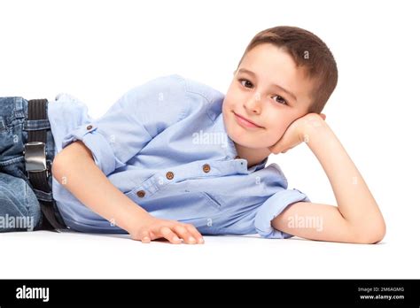 Cute Child Lying on Floor Stock Photo - Alamy