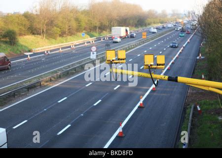 Average speed cameras on the M6 motorway in Cheshire,UK Stock Photo - Alamy