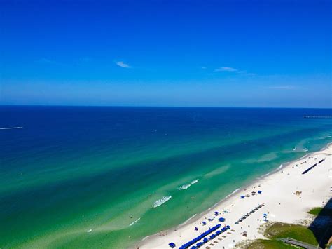 Blue sky over emerald water this morning at Panama City Beach... photo from @uab_weatherman ...