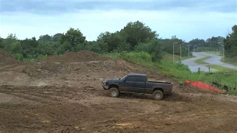 Lifted 06 Chevy Silverado Z71 mudding - YouTube