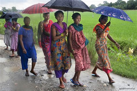 eggs.in.art.english: 28-Jul-2011: Women-rain, Chitwan jungle, Nepal.