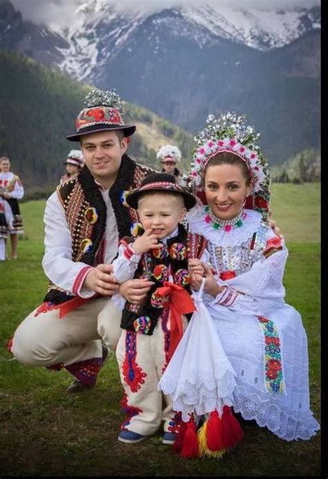 The whole family in a traditional attire, Zdiar, Slovakia.(this is not the couple´s son. It is ...