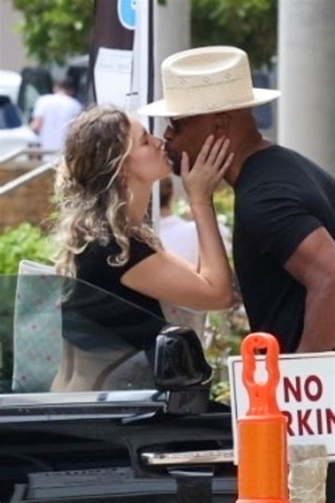 Jamie Foxx and girlfriend Alyce Huckstepp kiss while shopping