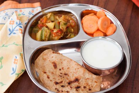 Dinner Meal Plate:Tawa Paratha,Aloo Turai Subzi,Curd & Salad by Archana ...