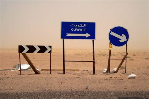 Kuwait this way ! | Assorted road signs in the Kuwaiti deser… | Bob McCaffrey | Flickr