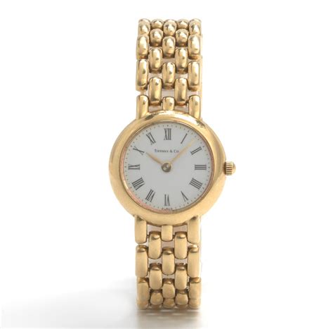A Tiffany & Co Ladies' 18k Gold Watch , 12.13.13