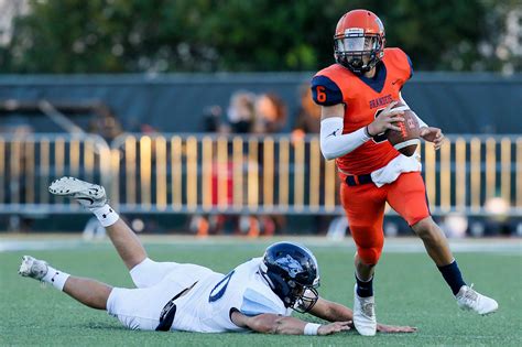 Brandeis quarterback turns his jersey into tribute to the mom he lost ...