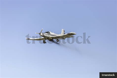 Small plane flying by Jan MacKenzie - Truestock