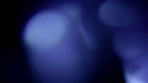 Blue Light Leak Overlay - Big Bokeh - Black Background — Free Stock Footage Archive