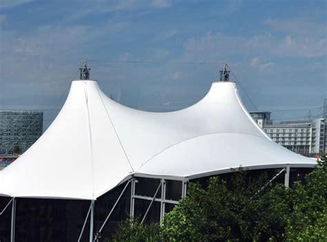 45m span tensile fabric roof with additional cable-net for sound ...