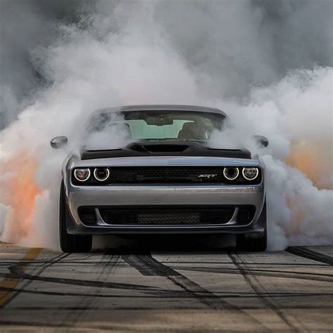 Rubber on fire! #dodge #challenger #hellcat #lovecars #burnout 📷@iamted7 #exoticcars #vehicles # ...