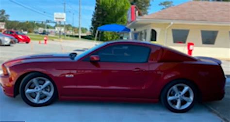 Restaurant owner sells 'candy apple red' Mustang to pay her employees