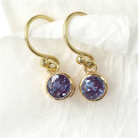 alexandrite earrings in 18ct gold, june birthstone by lilia nash jewellery | notonthehighstreet.com