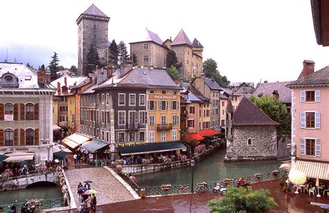 Old River Castle and Bridge in Downtown Annecy France Photograph by ...