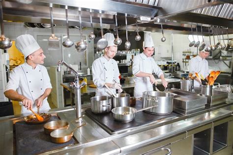 Premium Photo | Cook cooks in a restaurant.