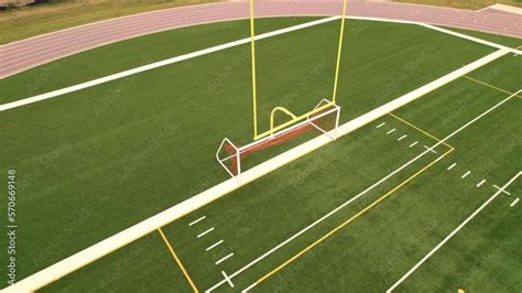 Rugby field grass view. Football field with green grass and white paint lines and marks. Sports ...