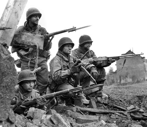 Heavily armed american soldiers during the Battle of The Bulge, January ...