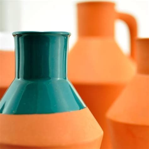 WGVI Cylinder Glass Vase vs Green Glazed Terracotta Vase - Slant