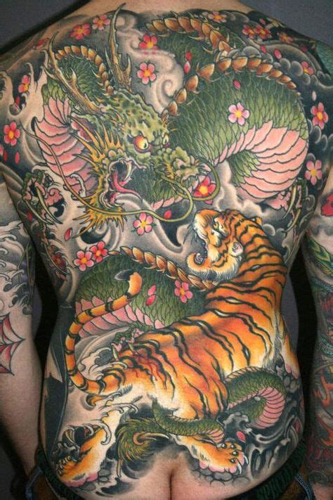 30 Best Tiger And Dragon Tattoo Designs ideas | dragon tattoo, dragon ...