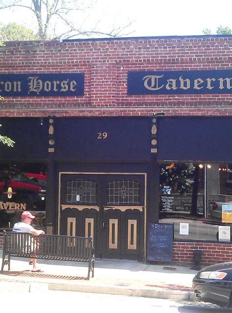 Iron Horse Tavern has a great outdoor seating area, an old red phone booth and great pub food ...