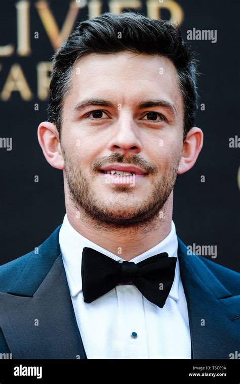 Jonathan Bailey poses on the red carpet at the Olivier Awards on Sunday ...