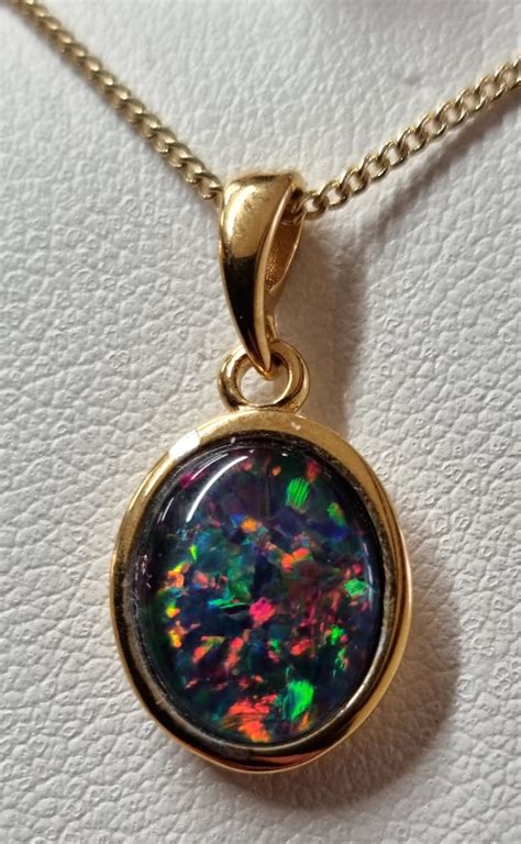 Australian Opal Pendant 11x9mm