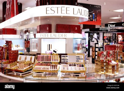 Estee Lauder cosmetics display in a shopping mall Stock Photo - Alamy