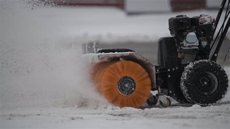 Snow Removal with Gasoline Brush Broom 24572184 Stock Video at Vecteezy