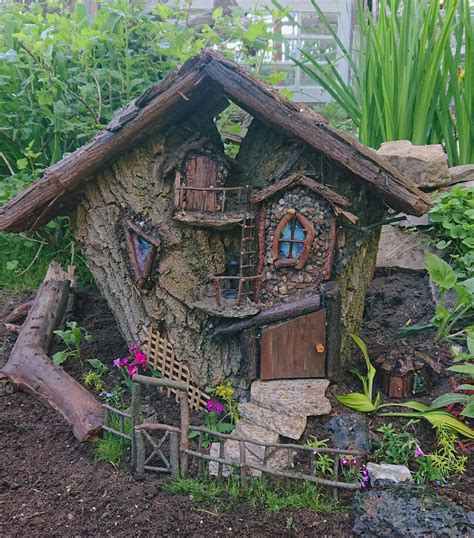 I just finished another log fairy house. I just need a few more little plants for the garden and ...