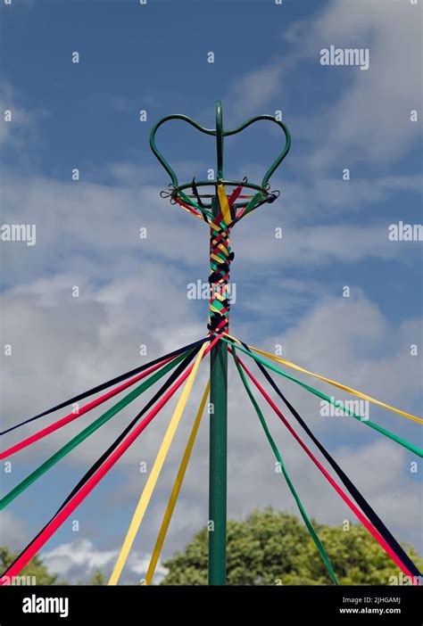 Metal Maypole With Coloured Ribbons Wrapped Round, New Forest UK Stock ...