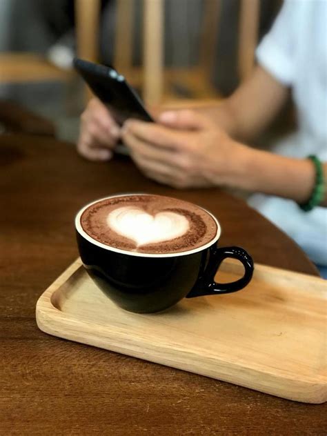 Heart latte art coffee cup 10136367 Stock Photo at Vecteezy