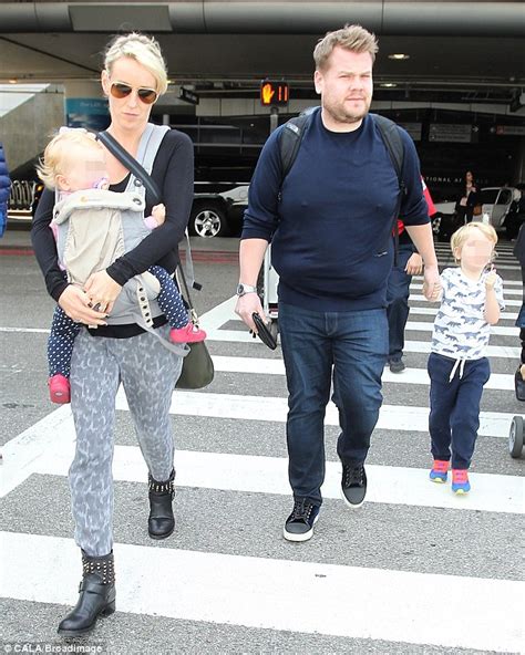 James Corden looks raring to get back to work after jetting into Los Angeles with wife and ...