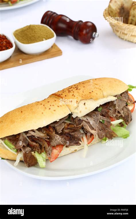 Traditional Turkish doner kebab shawarma in bread sandwich Stock Photo - Alamy