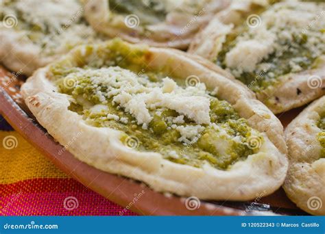 Mexican Sopes with Grated Cheese and Green Salsa, Mexican Food Spicy in Mexico Stock Image ...