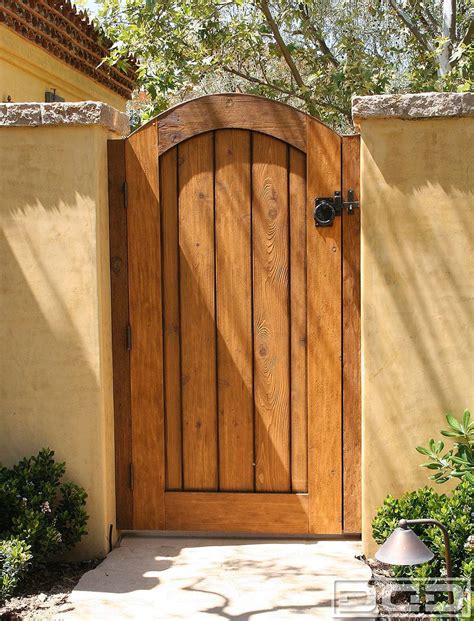 Architectural Gates 14 | Custom Designer Pedestrian Gate - Dynamic Garage Door | Wood gate ...