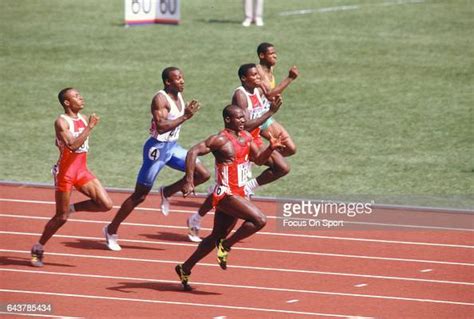 Carl Lewis of the United States and Ben Johnson of Canada competes in ...