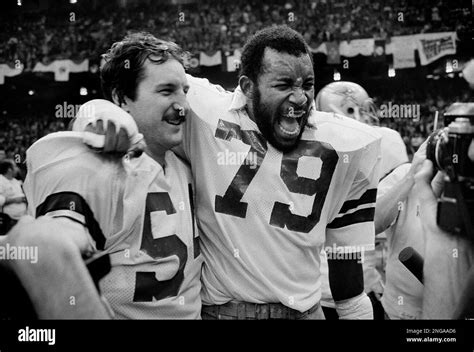 Tackle Randy White, left, and defensive end Harvey Martin, Dallas Cowboys teammates, shared the ...