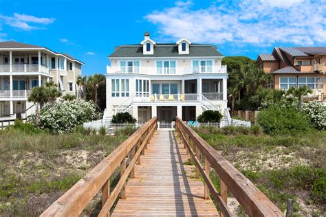 The ultimate Charleston beach vacation! Catch spectacular views from this spacious 5 bedroom ...