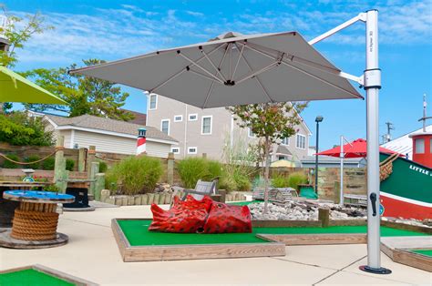 Find high-quality commercial patio umbrellas from Resort Contract Furnishings – offering the ...