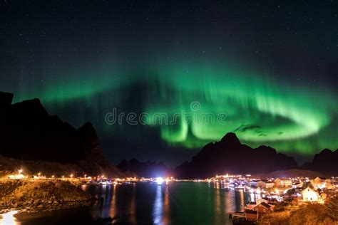 Northern Lights Over the Vilage of Reine Stock Image - Image of ...