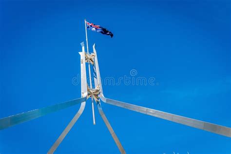 Australian Flag Flying on Top of the Parliament House in Canberr Stock ...