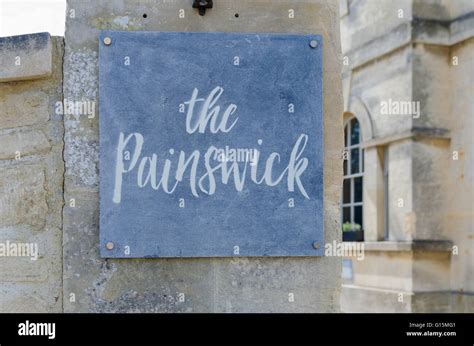 Sign at entrance to The Painswick Hotel and Restaurant in Painswick, Gloucestershire Stock Photo ...