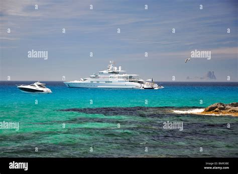 Boats off illetes beach formentera hi-res stock photography and images - Alamy