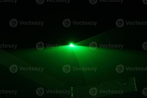 green beam laser beam on dark background 20465760 Stock Photo at Vecteezy