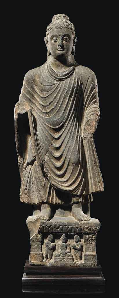 A GREY SCHIST STATUE OF BUDDHA , GANDHARA, 2ND/4TH CENTURY | Christie's