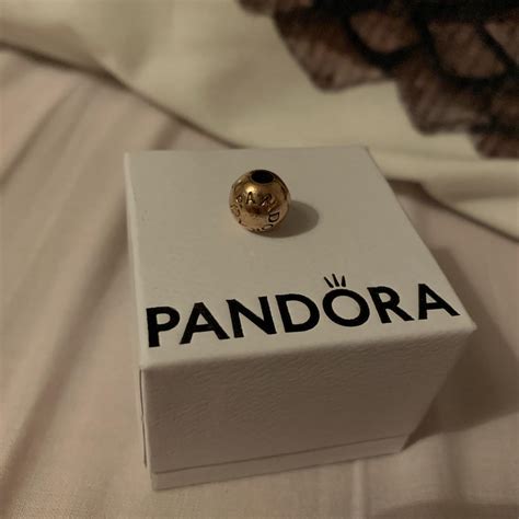 Gold/ rose gold pandora clip charm. Good conditon.... - Depop