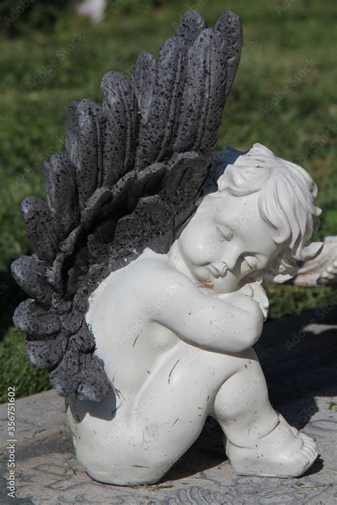 statue of baby angel Stock Photo | Adobe Stock