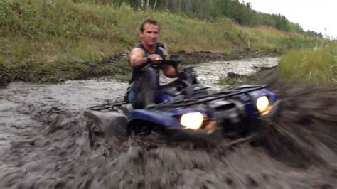 Mud bogging with ATVs - YouTube